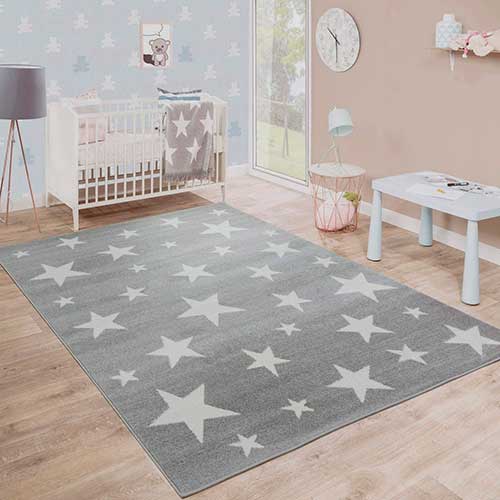 Alfombra de color gris con estrellas blancas